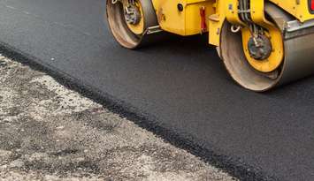 Paving operations. (File photo by MartinFredy/iStock / Getty Images Plus)