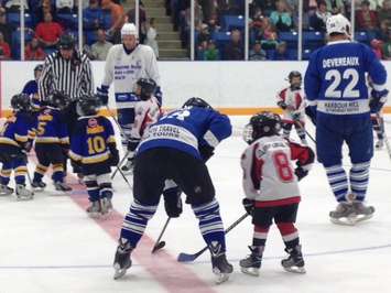 Seaforth native Boyd Devereaux, number 22, helps during the 1st Intermission game featuring younger hockey pros. (Photo by Steve Sabourin)