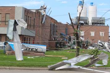 Crews assess and clean up the damage left near the EC Row Expressway and Central Avenue in Windsor on August 25, 2016 after a tornado hit the area. (Photo by Ricardo Veneza)