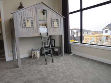 An upstairs bedroom inside the Dream Home at 2162 Ironwood Rd. (Photo by Miranda Chant, Blackburn News)