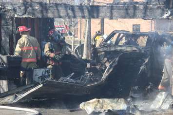 Essex firefighters battle a residential blaze in the 100-block of Park St. in Harrow, March 18, 2015. (Photo by Mike Vlasveld)