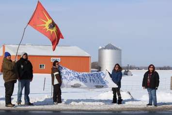 Walpole Island residents join the nationwide #ShutDownCanada movement at the intersection of Hwy. 40 and Dufferin Ave. on February 13, 2015. (Photo by Jason Viau)
