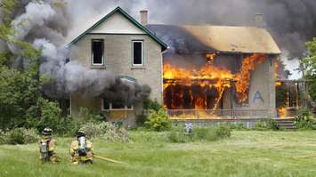 The Sarnia Fire Rescue Service conducts live fire training at 2172 London Line. June 9, 2017 (Photo by Melanie Irwin)