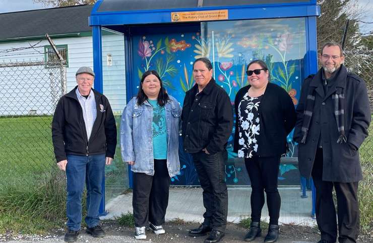 Points Plaza bus stop in Kettle Point (L to R) Lambton Shores Mayor Doug Cook, Artist Bridget George, Artist Moses Lunham, Kettle & Stony Point First Nation Chief Kimberly Bressette, Southwind Dev. Corp. CEO Michael George (Photo courtesy of Huron Shores Area Transit)