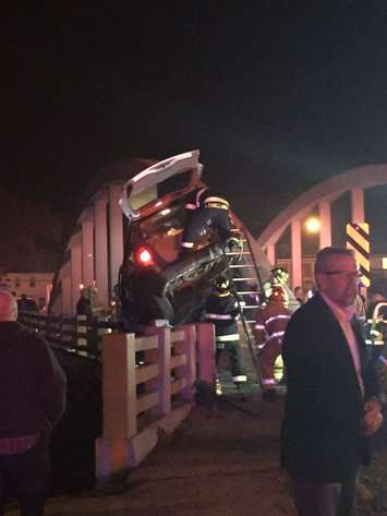 A vehicle collides with the River Canard bridge in Amherstburg, December 6, 2015. (Photo courtesy  @JPed024/Twitter)