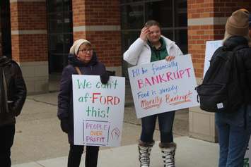 Signs are displayed at a rally at the University of Windsor, January 24, 2019. Photo by Mark Brown/Blackburn News.