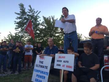 Unifor Local 200 president Chris Taylor leads a rally against the TPP in Essex on September 23, 2015. (Photo by Ricardo Veneza)