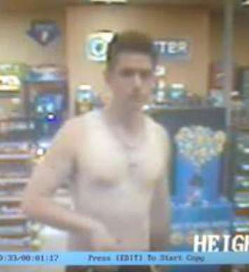 The OPP has release a suspect photo of a man wanted in connection with a robbery in Lakeshore on July 26, 2015. (Photo courtesy OPP)