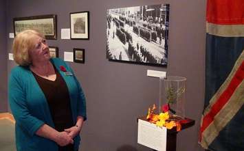 Susan Martin of Grey Roots Museum near Owen Sound shows off the new exhibit, called Mrs. Eaton's War.
Photo by Kirk Scott.