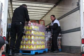 Street Help Homeless Centre receives its largest ever food donation on December 15, 2014. (Photo by Jason Viau)