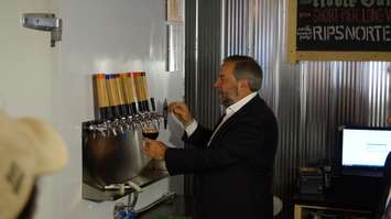 Federal NDP leader Tom Mulcair discusses tax rate cuts for small Canadian businesses at Refined Fool Brewery in Sarnia July 23, 2015 (BlackburnNews.com Photo by Briana Carnegie)