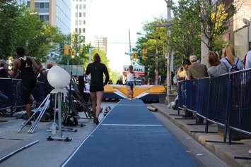 Athletes compete in a pole vaulting competition on Ouellette Ave., May 22, 2015. (Photo by Jason Viau)