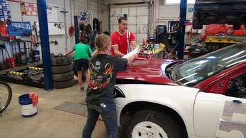 Detail work on JMSS tech club race car May 19 2015 (Photo by Simon Crouch) 