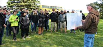 Geoff King speaks at the Steenstra Drain during a bus tour of innovative drainage projects. May, 2023. Submitted photo.
