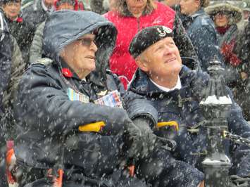 Veteran Ivan Garnett (left) speaks to another veteran during the Remembrance Day ceremony  in Victoria Park, November 11, 2019. (Photo by Miranda Chant, Blackburn News)