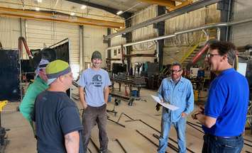 Labour Minister/Lambton-Kent-Middlesex MPP Monte McNaughton meets with workers at Anderson-Webb.  4 July 2022.  (Photo from McNaughton's Twitter)