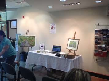 Kathryn Evans painting for raffle draw supporting Lambton Mosaic (BlackburnNews.com Photo by Briana Carnegie June 5, 2015)