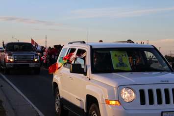 Supporters come out to the Communications Rd. overpass on Hwy. 401 for the repatriation ceremony of fallen veteran and Wheatley native John Gallagher on November 20, 2015. (Photo by Ricardo Veneza)