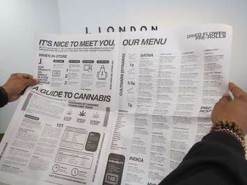 A newspaper that will be given to J. London customers. (Photo by Miranda Chant, Blackburn News)