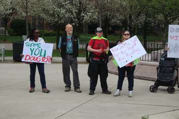 `Jenny`, far right, joins other speakers and demonstrators at a rally protesting planned government cuts at Charles Clark Square, Windsor, May 1, 2019. Photo by Mark Brown, Blackburn News.