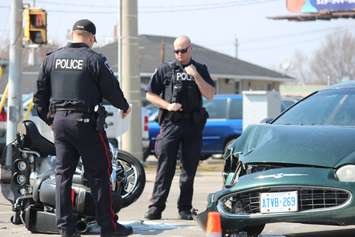 One person has been sent to hospital following a crash at the intersection of Lauzon Rd. and McHugh St., April 1, 2015. (Photo by Jason Viau)