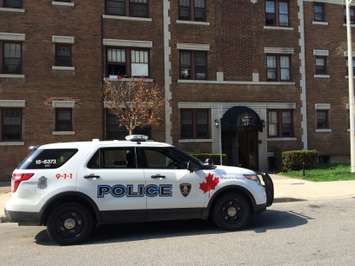 Windsor police investigate a stabbing on Ellis St. E just off Ouellette Ave. (Photo by Jason Viau)