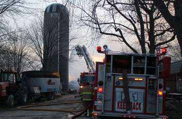 Area fire departments battle blaze at dairy farm in Tecumseh, April 18, 2016. (Photo by Maureen Revait) 