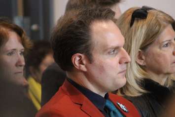 Vincent Georgie, director of the University of Windsor School of Creative Arts. listens during dedication ceremonies on March 22, 2018. Photo by Mark Brown/Blackburn News.