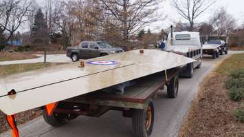 Sarnia's F-86 Sabre Golden Hawk is returned to Germain Park. December 8, 2014 (BlackburnNews.com photo by Jake Jeffrey)
