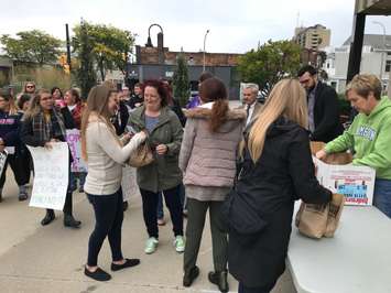 People gather at a rally to end poverty in Sarnia. October 5, 2018 Photo by Melanie Irwin