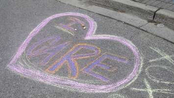 Supportive message in chalk at Museum Square, June 7, 2016. (Photo by Miranda Chant, Blackburn, News)