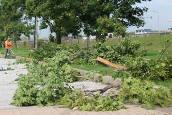 Crews assess and clean up the damage left near the EC Row Expressway and Central Avenue in Windsor on August 25, 2016 after a tornado hit the area. (Photo by Ricardo Veneza)
