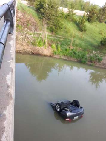 A car that ended up in the waterway just east of Airport Rd. near Jackson Rd. May 21, 2018. (Photo sent to BlackburnNews from unknown source)