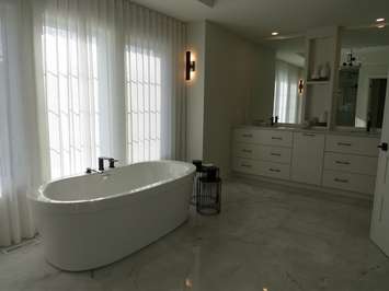 The ensuite bathroom in the master bedroom inside the Dream Lottery dream home at 1761 Upper West Ave. in London. (Photo by Miranda Chant, Blackburn News)