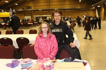 Mackenzie St.Pierre with Constable Sherri Keller. December 17, 2016. (Photo by Natalia Vega)