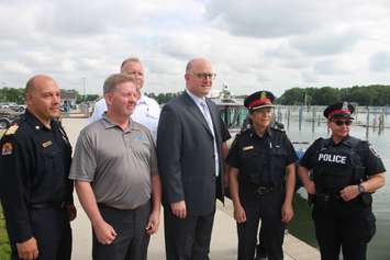 From left, Windsor Fire Chief Stephen Laforet, Port Windsor CEO Steve Salmons, Harbourmaster Peter Berry, Windsor Mayor Drew Dilkens, Windsor Acting Police Chief Pam Mizuno and Windsor Police Staff Sergeant Sue Garrett at Lakeview Park Marina, July 12, 2019. Photo by Mark Brown/Blackburn News.