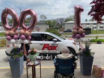 Sarah Woodley from The Fox morning show and daughter Daisy participate in a 100th birthday parade for Lillian Price. May 22, 2020 (Photo provided by Jenica Tanguay)