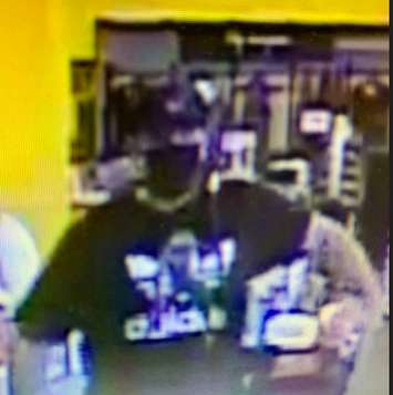 CK police are asking for help to identify this person after a theft at Giant Tiger in Chatham on August 24, 2022. (Photo from Chatham-Kent police)
