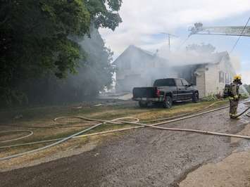 The scene of a house fire on Erieau Road. July 11, 2022. (Photo courtesy of Chatham-Kent Fire and Emergency Services)