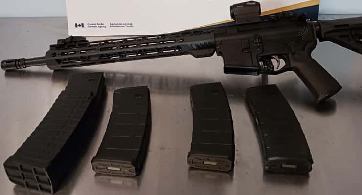 A semi-automatic rifle and ammunition seized at the Ambassador Bridge, December 18, 2024. Photo courtesy CBSA/Border Services Southern Ontario Region/X.