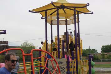 Students, parents and teachers enjoy a sneak preview of the Farrow Riverside Miracle Park in Windsor, May 24, 2019. Photo by Mark Brown/Blackburn News.