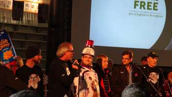 Mayor Randy Hope congratulates Superfan Chad Peterson at the CK Hockeyville results announcement (Photo by Jake Kislinsky)