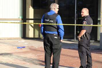 Windsor police investigate a stabbing at 810 Ouellette Ave., April 24, 2015. (Photo by Jason Viau)