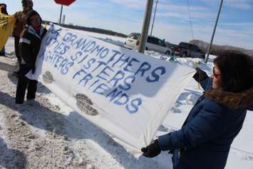 Walpole Island residents join the nationwide #ShutDownCanada movement at the intersection of Hwy. 40 and Dufferin Ave. on February 13, 2015. (Photo by Jason Viau)