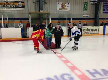 Captain Lexi Smith(Right) and Chinese captain Yu Baiwai take the ceremonial puck drop