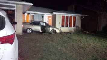 Chatham-Kent police have arrested a 17-year-old after the youth allegedly crash a stolen car into the front of a Chippewa Dr. home while impaired. (Photo courtesy Alana Francis)