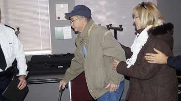 MaryLou Schwemler and husband Matt leave a media briefing where OPP release new information in the death of MaryLou's sister Karen Caughlin in 1974.  December 14, 2017 (Photo by Melanie Irwin)
