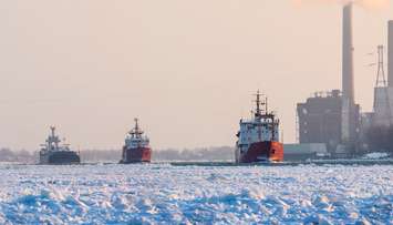 The Canadian Coast Guard Ships Samuel Risley and Griffon escort a commercial ship through heavy ice on the St. Clair River Jan 15 2015.  Photo credit: Richard Dompierre. (Used with permission.)
