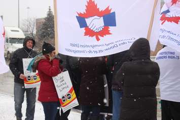 Members of the Customs and Immigration Union (CIU) rally along Huron Church Rd in Windsor on January 12, 2018. Photo by Mark Brown/Blackburn News