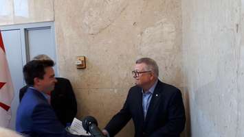 Safety Minister Ralph Goodale shaking with Olivier Cullen at the Bud Cullen dedication. August 10, 2018. (Photo by Colin Gowdy, BlackburnNews)